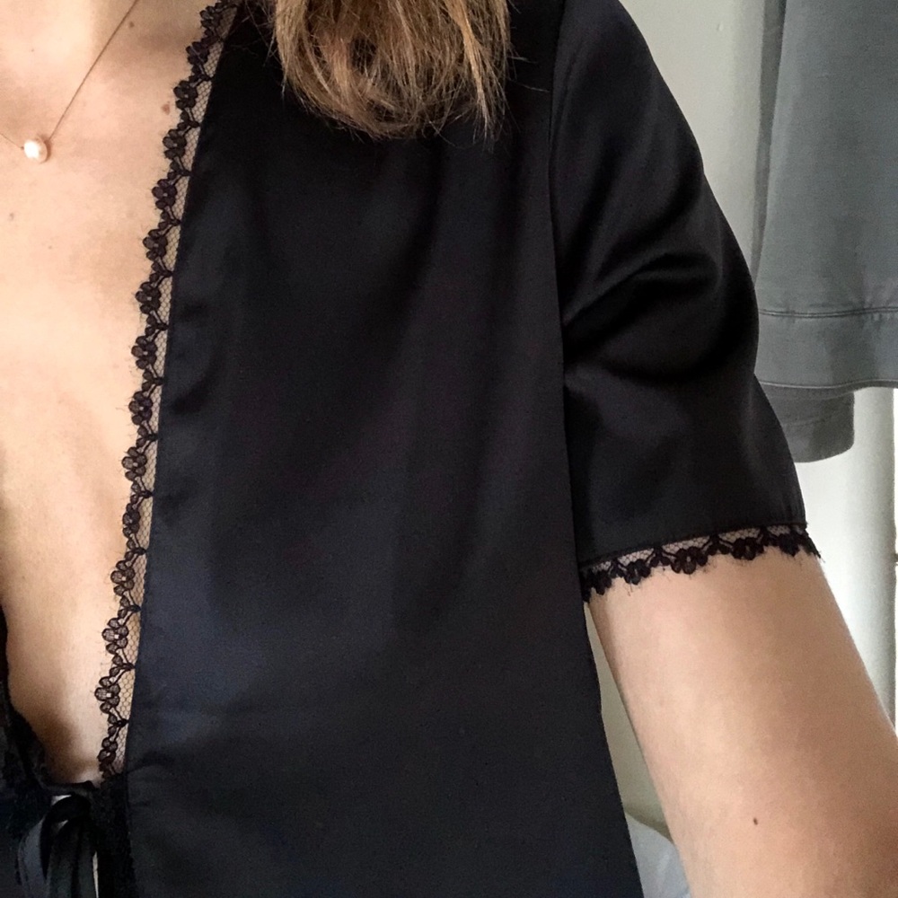 Silky and suave black tie top